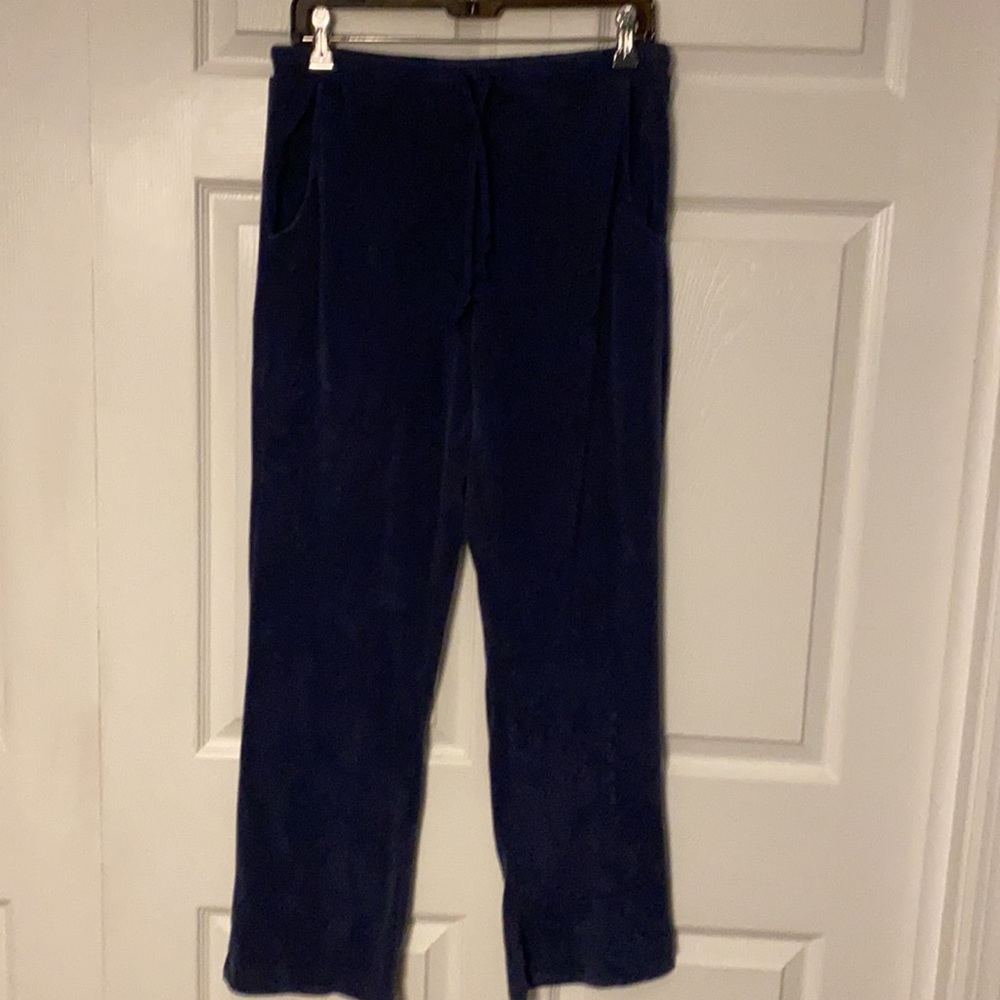 Women’s size medium Nike old school terry cloth track pants in navy.